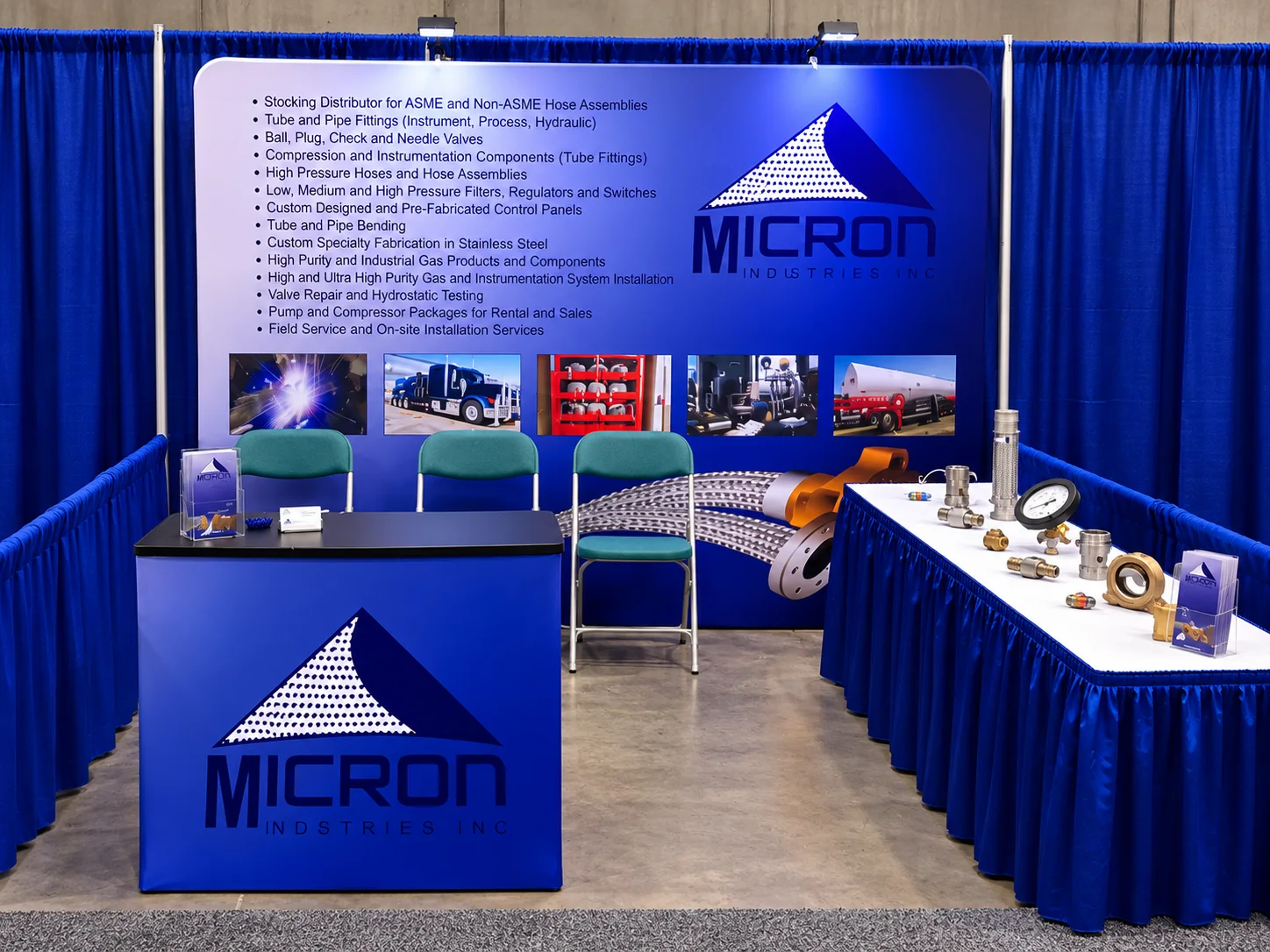 Micron Industries trade show booth displaying tank and equipment services
